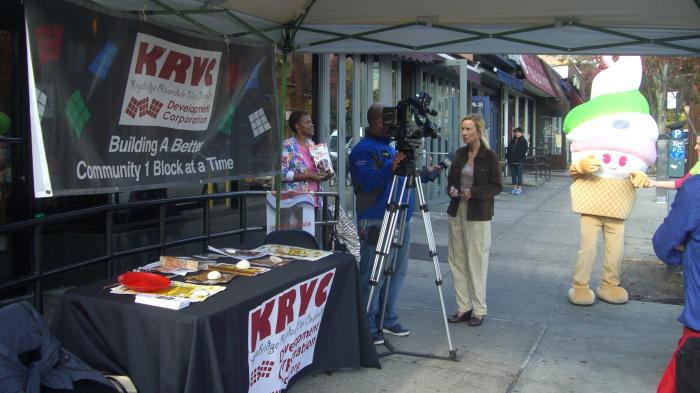 News 12 Interviews KRVC's Executive Director about the Upcoming Festival with Menchie in the Background!