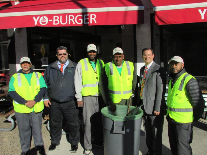 PHOTO CAPTION: Council Member Andrew Cohen stands with Mario La Rosa, Manager of Fedcap Operations, and some of his workers after announcing the allocation of $65,000 to the non-profit organization for help maintaining commercial corridors throughout Riverdale.